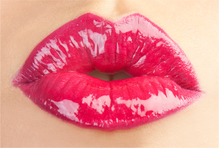 Close up of a womans red pouting lips